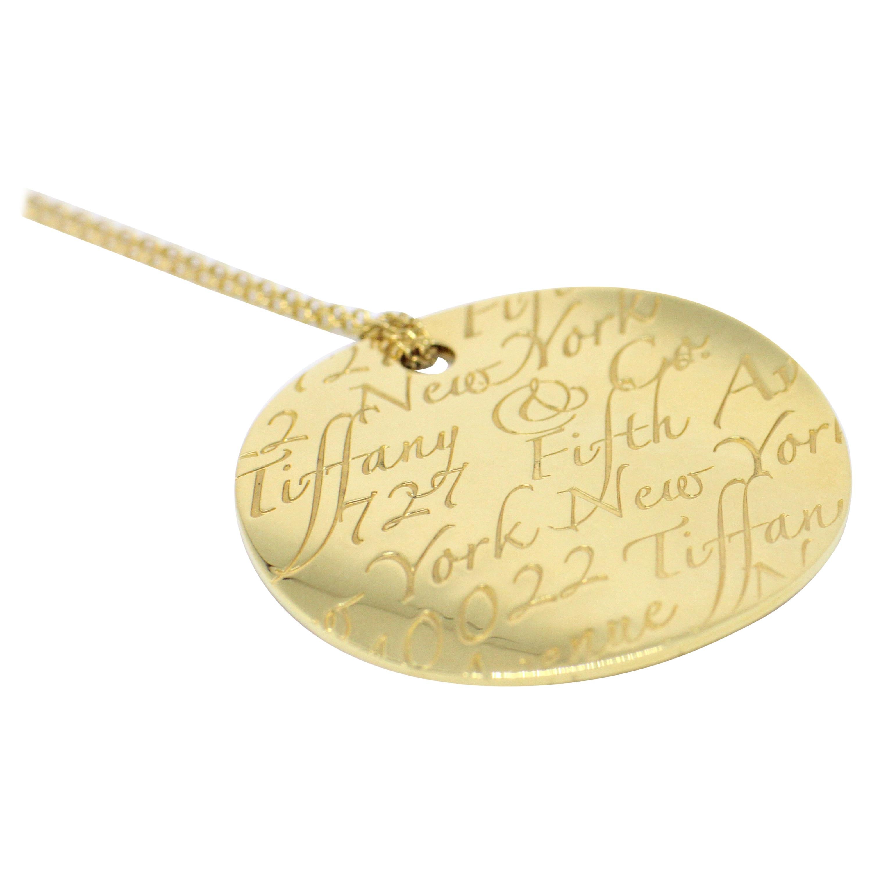 Tiffany & Co. Notes 18 Carat Yellow Gold Round Pendant Necklace