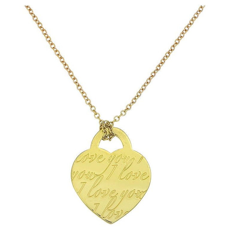 Tiffany and Co Notes 18K Heart Pendant and Necklace For Sale at 1stDibs