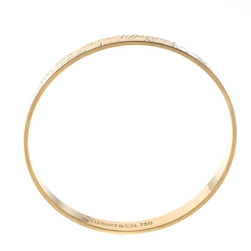Bound to sit around your wrist and exude beauty, this Tiffany & Co. is a dream buy. It is made from 18k yellow gold and engraved with Tiffany notes all over, a design achieved with precision and careful effort. The bracelet has a smooth finish and
