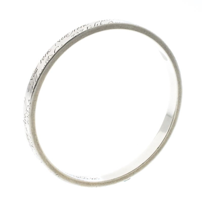 Bound to sit around your wrist and exude beauty, this Tiffany & Co. is a dream buy. It is made from silver and engraved with Tiffany notes all over, a design achieved with precision and careful effort. The bracelet has a smooth finish and an appeal