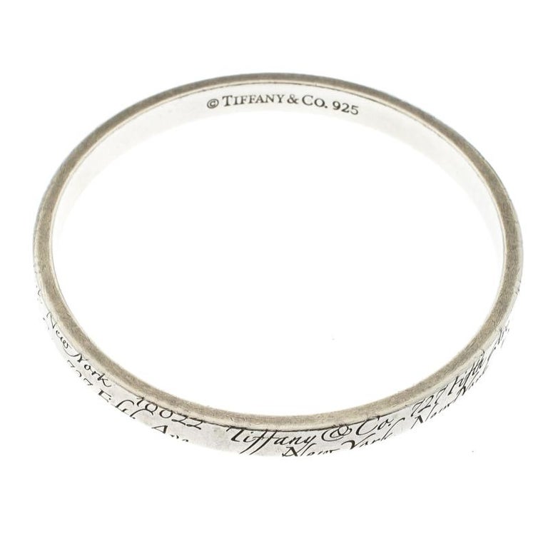 tiffany-and-co-notes-engraved-silver-bangle-bracelet-19cm-at-1stdibs