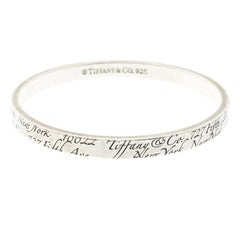 Tiffany & Co. Notes Engraved Silver Bangle Bracelet 19cm