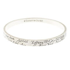 Tiffany & Co. Notes Engraved Silver Bangle Bracelet 19cm