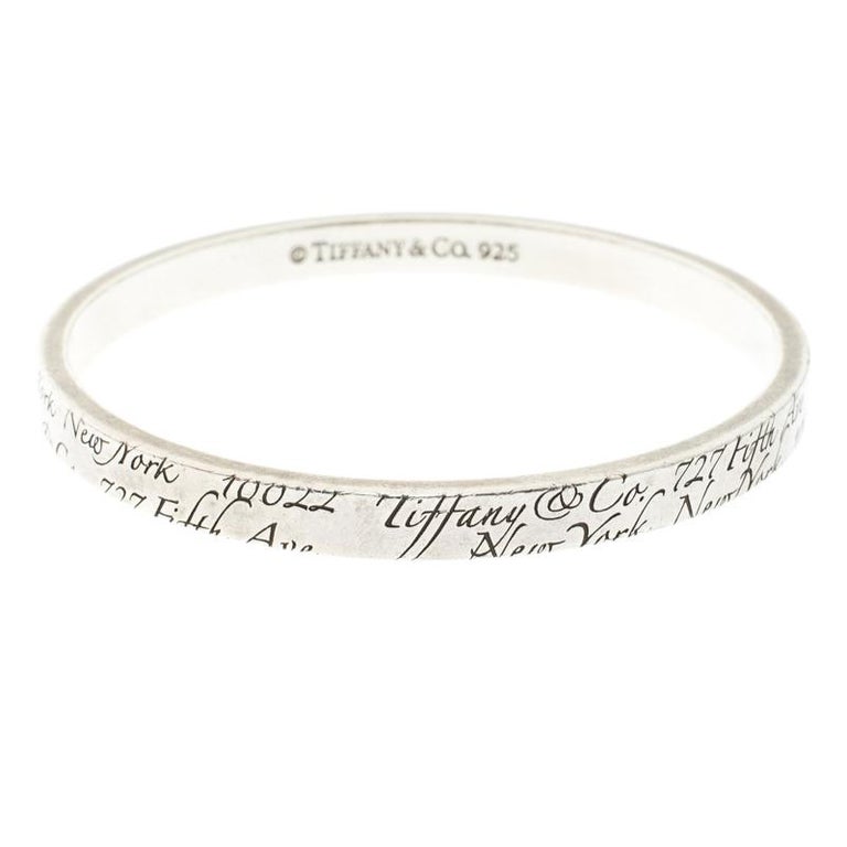 Tiffany and Co. Notes Engraved Silver Bangle Bracelet 19cm at 1stDibs | tiffany  bracelet engraved