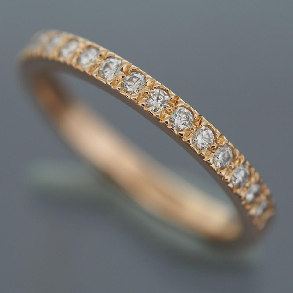 Item: Tiffany & Co. Novo Diamond Half Eternity Ring
Stones: Diamond 
Metal: 18K Rose Gold
Ring Size: US SIZE 4.75 UK SIZE J 1/2
Internal Diameter: 15.65 mm
Measurement: 2.0 mm
Weight: 2.1 Grams
Condition: Used (repolished)
Retail Price: USD--- excl.