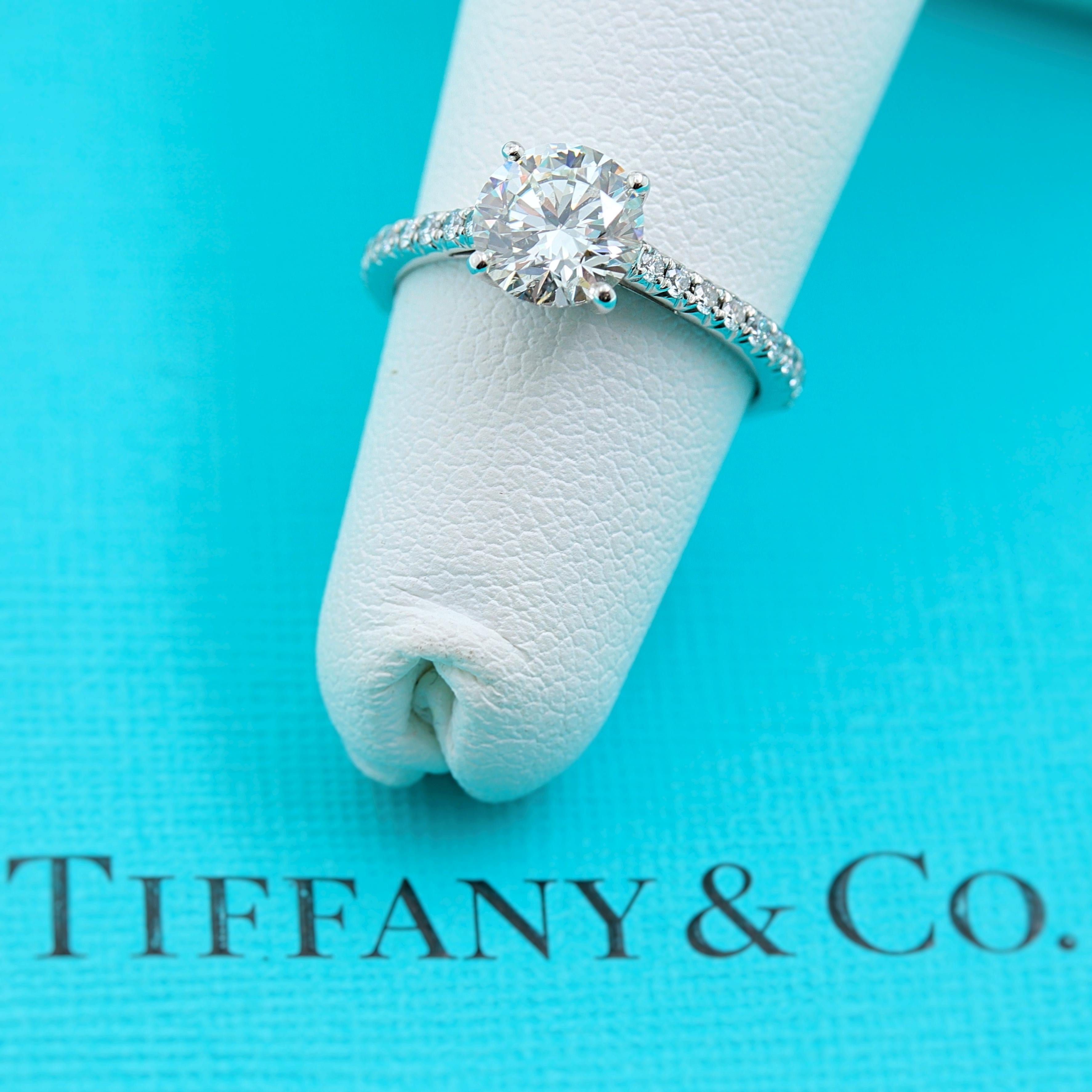 Tiffany & Co. Novo Diamond Engagement Ring 

Style:  Novo Solitaire with Micro - Pave Diamonds on the Band
Metal:  Platinum
Size:  5 - sizable
Total Carat Weight:  1.21 tcw
Diamond Shape:  Round Brilliant 1.05 cts
Diamond Color & Clarity:  I -