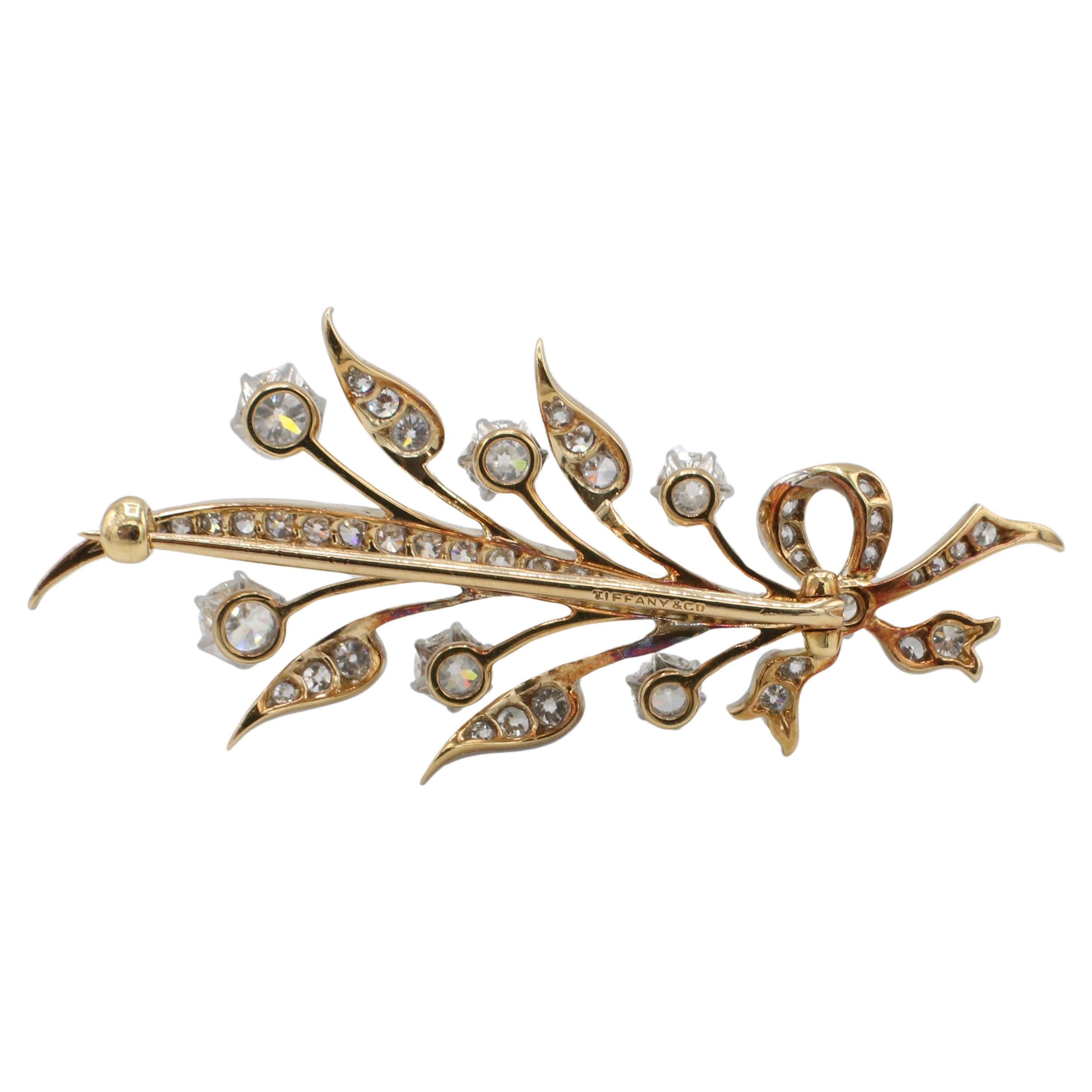 Tiffany & Co. Old European Cut Natural Diamond Leaf Brooch Pin Platinum & Gold
Metal: Platinum & 18k yellow gold
Weight: 9 grams
Dimensions: 53 x 25mm
Signed: Tiffany & Co.
Diamonds: Approx. 2.20 CTW F-G VS Old European cut natural diamonds
