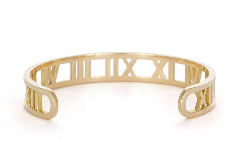 Tiffany and Co. Open Atlas Roman Numeral 18 Karat Yellow Gold Cuff Bracelet at 1stDibs tiffany