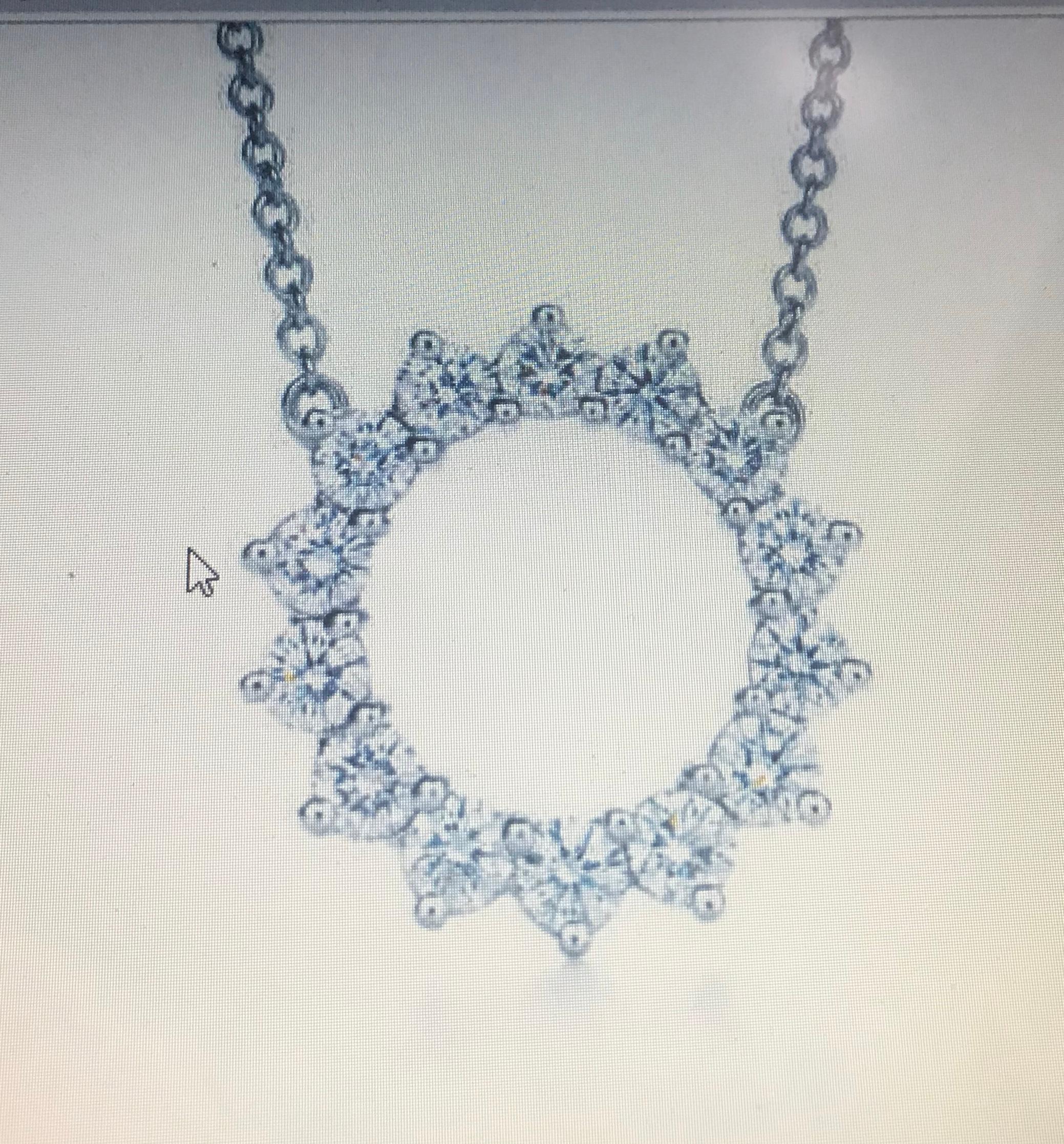 Beautiful Tiffany & Co pendant with round brilliant cut diamonds. Absolutely stunning shine and  so perfect for everyday wear.
 Each diamond matches in quality, F in color and VS in clarity, and all are of the same size. The are precisely set within