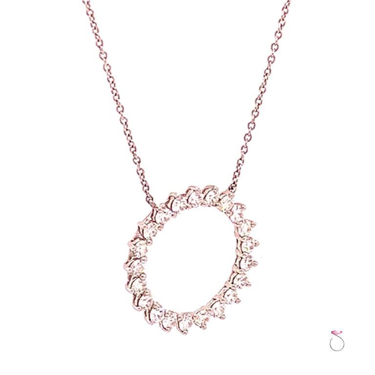 Authentic Tiffany & Co. open circle diamond pendant with 16 inch chain in platinum. This beautiful medium size pendant is set with 21 round brilliant cut diamonds totaling 0.93 carat. The diamonds are prong set in an open circle design, 20.70 mm in