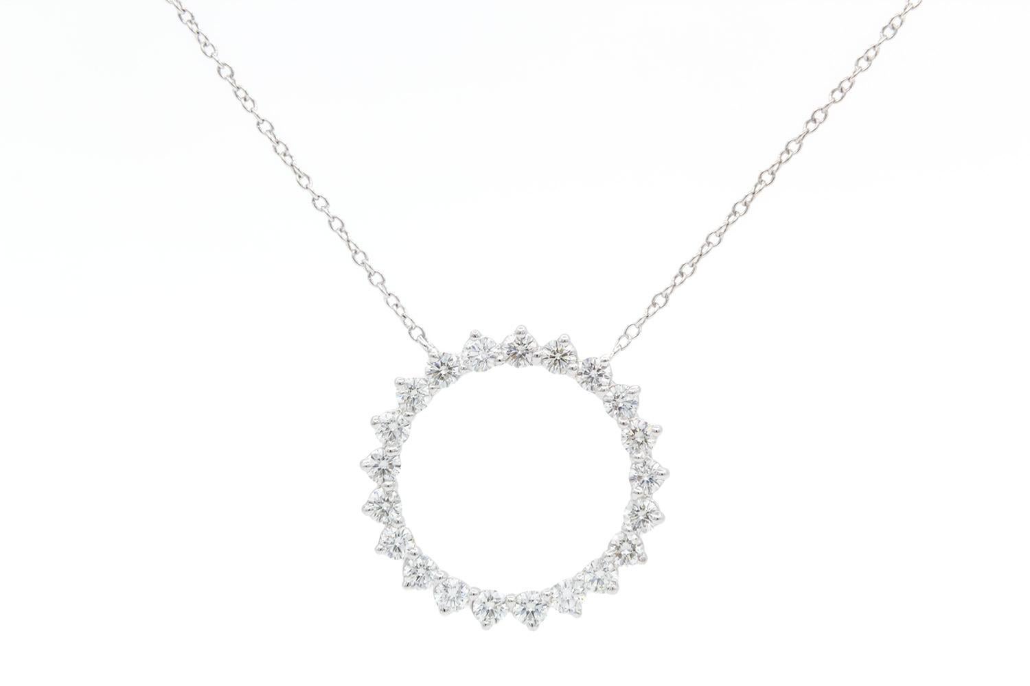 We are pleased to offer this Authentic Tiffany & Co. Open Circle Platinum & Diamond Medium Pendant Necklace. This gorgeous diamond pendant necklace features the classic Tiffany Open Circle design. The necklace measures 16.75