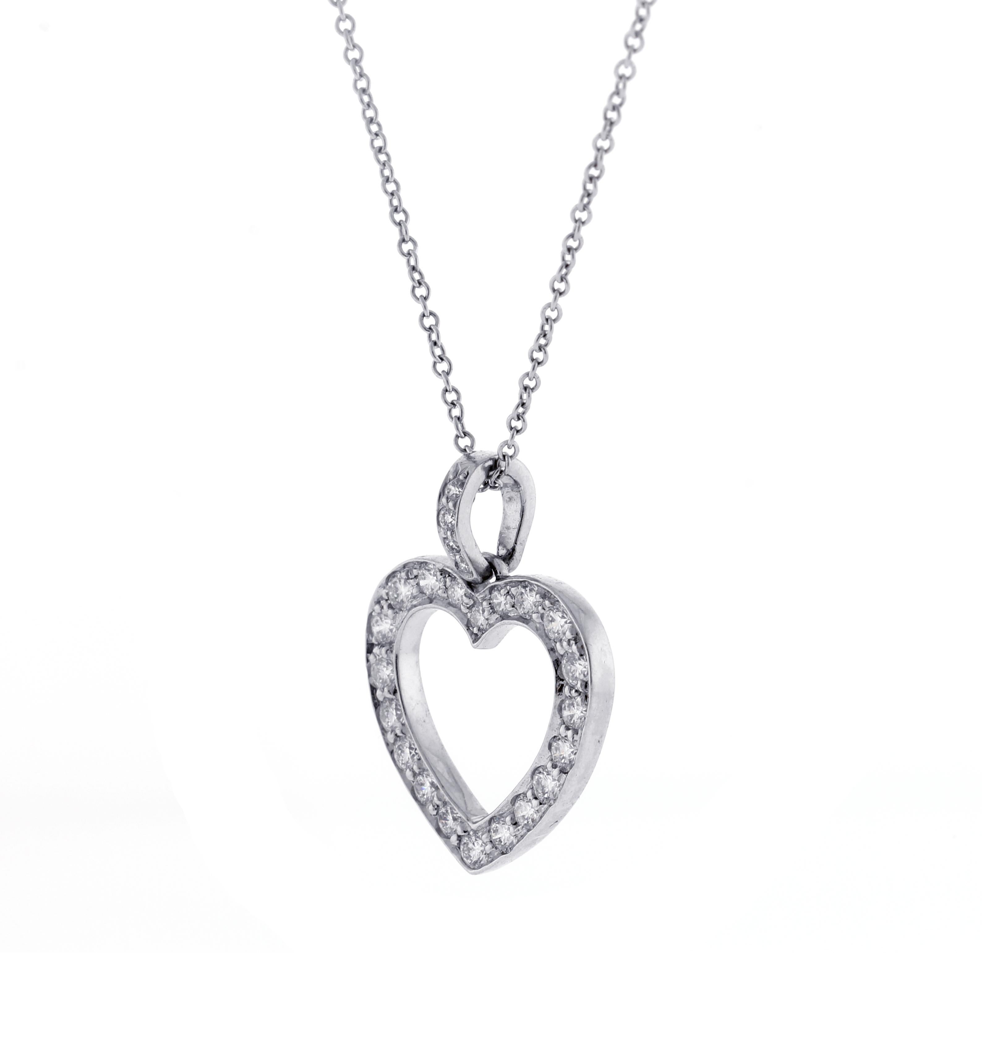 From Tiffany & Co. an open heart diamond pendant on a 16 inch necklace
♦ Designer: Tiffany & Co.
♦ Metal: Platinum
♦ Circa 1990s
♦ 11/16th of an inch wide 
♦ 24 Diamond=.55 carat, F-G VVS
♦ Tiffany Pouch
♦ Condition: Excellent , pre-owned
♦ Price: