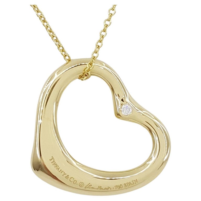  Tiffany & Co. Open Heart Pendant Diamond Necklace almost 8 grams of 18k gold For Sale