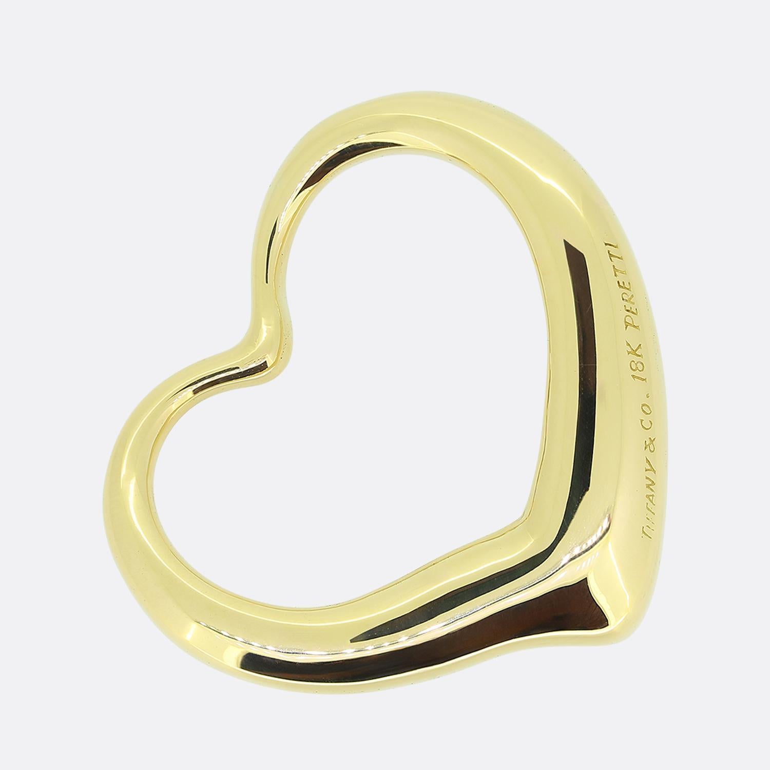 Here we have a beautifully crafted pendant from the world renowned jewellery designer, Tiffany & Co. Forming part of the Elsa Peretti collection, this open heart design celebrates the spirit of love. Crafted from 18ct yellow gold, the elegant curves