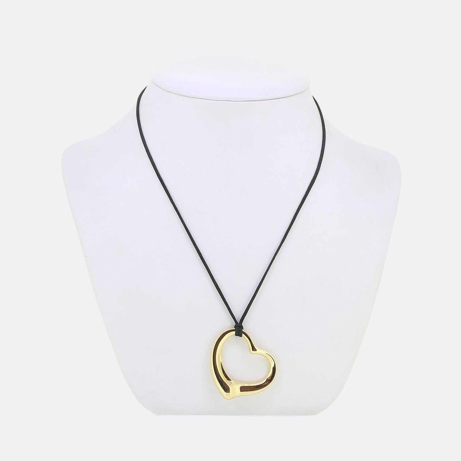 Here we have a beautifully crafted necklace from the world renowned jewellery designer, Tiffany & Co. Forming part of the Elsa Peretti collection, this iconic open heart design celebrates the spirit of love. Crafted from 18ct yellow gold, the