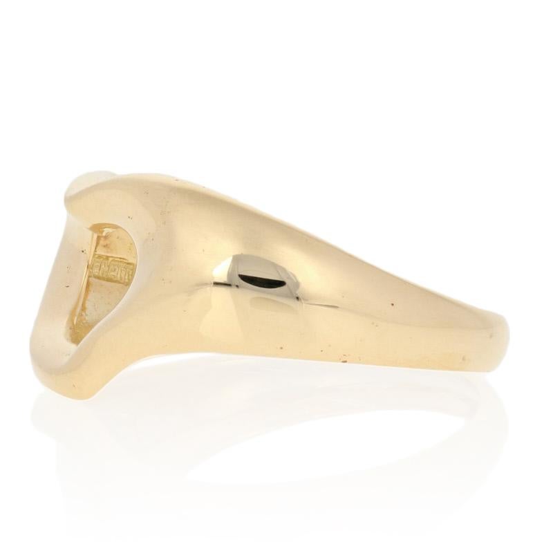 This ring is a size 5 1/2 - 5 3/4.

Brand: Tiffany & Co.
Designer: Elsa Peretti
Design: Open Heart

Metal Content: Guaranteed 18k Gold as stamped
Style: Statement
Face Height (north to south): 3/8