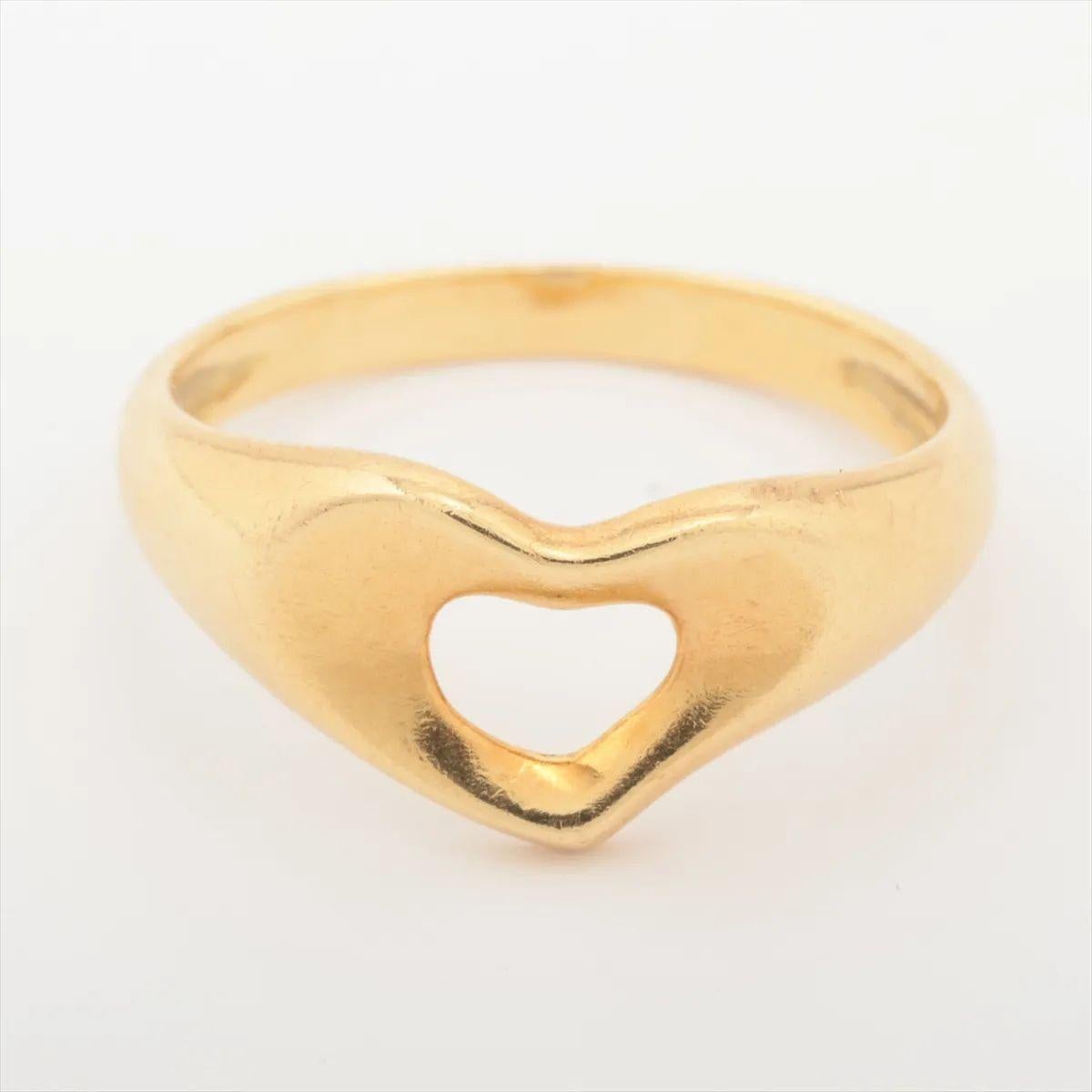 The Tiffany & Co. Open Heart Ring in yellow gold is a delicate and romantic design that captures the essence of love in its purest form. Crafted from polished yellow gold, it features Elsa Peretti’s iconic open heart motif, symbolizing warmth,