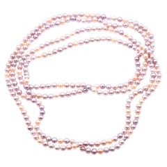 Tiffany & Co. Opera Length Strand of Pinkish Purple Pearls