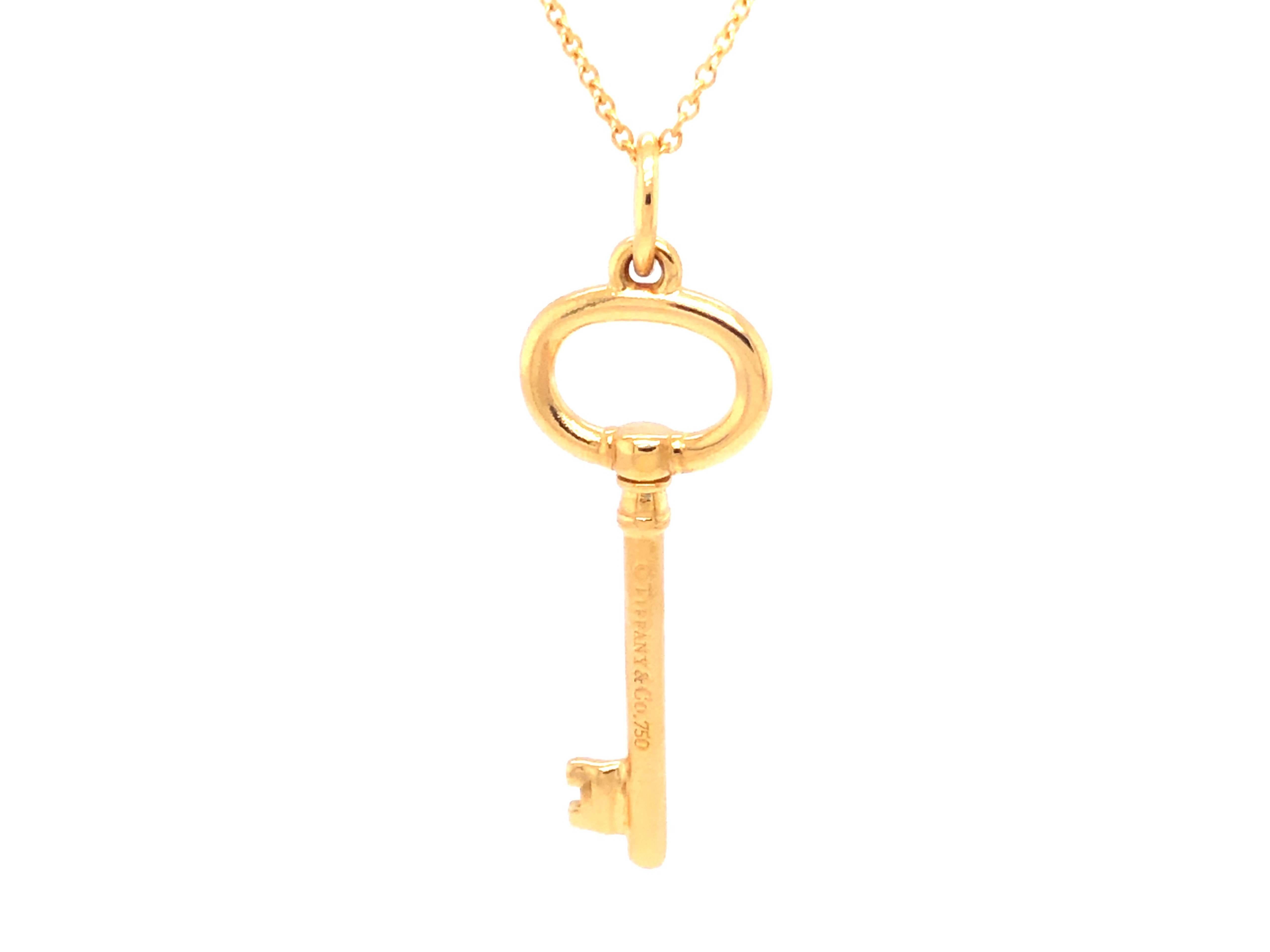 18k gold key pendant