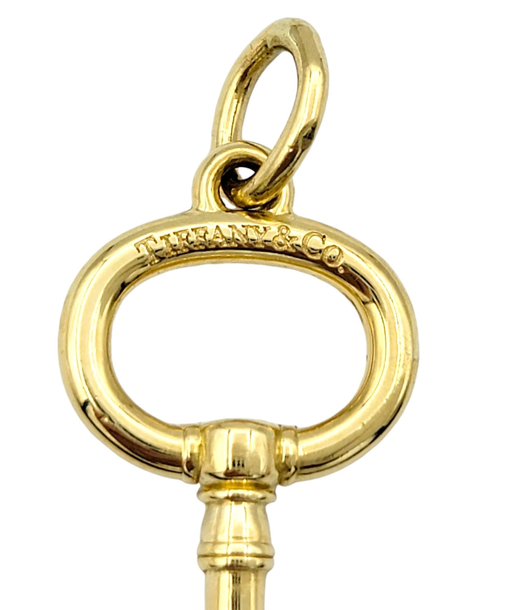 Women's or Men's Tiffany & Co. Oval Key Pendant / Charm in Polished 18 Karat Yellow Gold