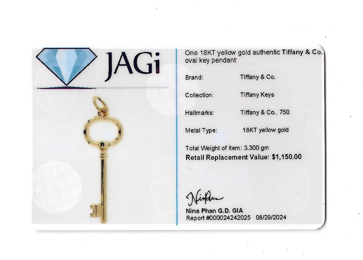 Tiffany & Co. Oval Key Pendant / Charm in Polished 18 Karat Yellow Gold 4