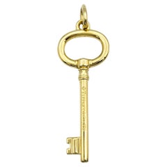 Tiffany & Co. Oval Key Pendant / Charm in Polished 18 Karat Yellow Gold