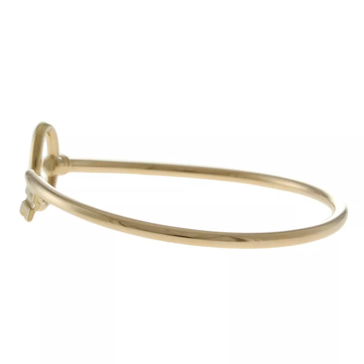 Modernist Tiffany & Co. Oval Key Wire Bracelet 18K Pink Gold Women's Bangle For Sale