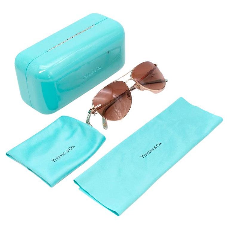 Tiffany and Co. Pale Gold Ribbon Temple Aviator Sunglasses at 1stDibs |  tiffany gold aviator sunglasses