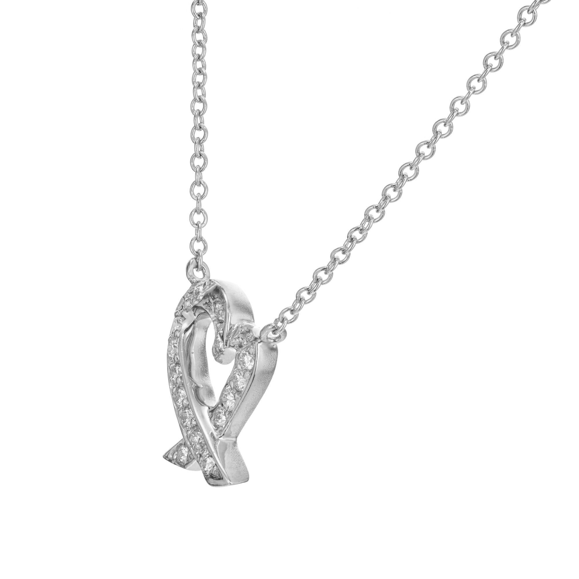 Iconic Tiffany & Co Paloma Picasso diamond heart pendant necklace. 17 round brilliant cut diamonds set in platinum. 16 inch chain. 

17 round brilliant cut diamonds, approx. .12cts 
Platinum 
16 inch platinum chain. 
