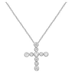 Tiffany & Co. Paloma Picasso 18 Karat Gold Diamond Cross Pendant 0.30 Carat