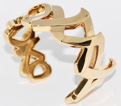 Tiffany & Co. Paloma Picasso 18 Karat Gold XO "Love and Kisses" Bangle Bracelet