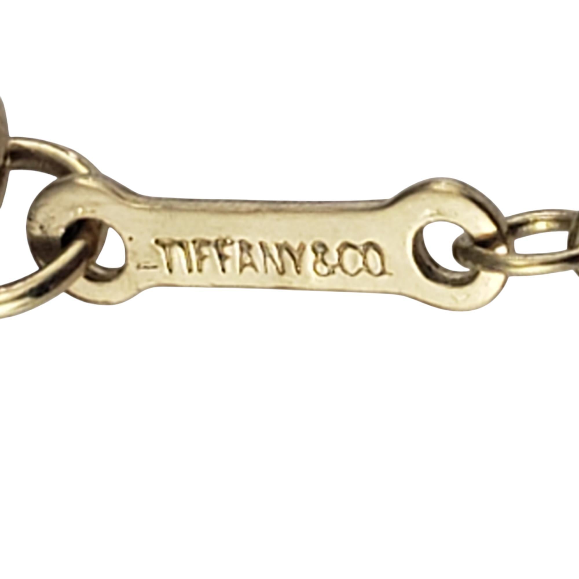 Tiffany & Co. Paloma Picasso 18K Gold Diamond Sun & Moon Pendant Necklace #20754 In Good Condition For Sale In Washington Depot, CT