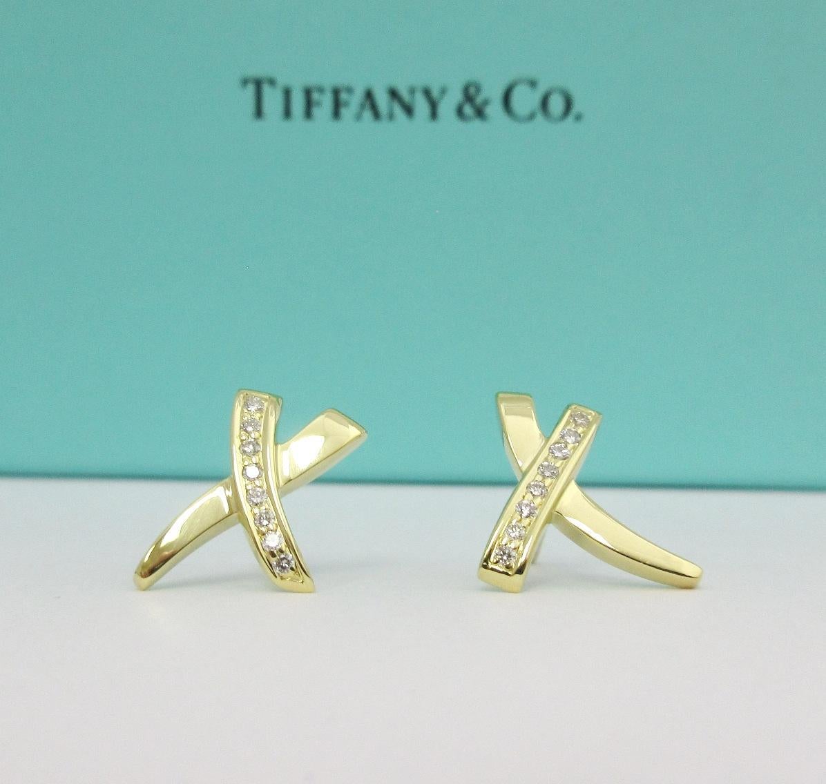 TIFFANY & Co. Paloma Picasso 18K Gold Diamond X Earrings

Metal: 18K gold
Measurement: 14mm long x 13mm wide
Weight: 3.70 grams
Diamond: 16 round diamonds, carat total weight .08 approx.
Hallmark: 