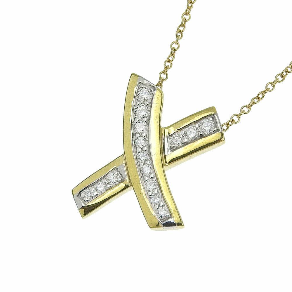 TIFFANY & Co. Paloma Picasso 18K Gold Diamond X Pendant Necklace

Metal: 18K Yellow Gold
Weight: 4.0 grams
Chain: 16