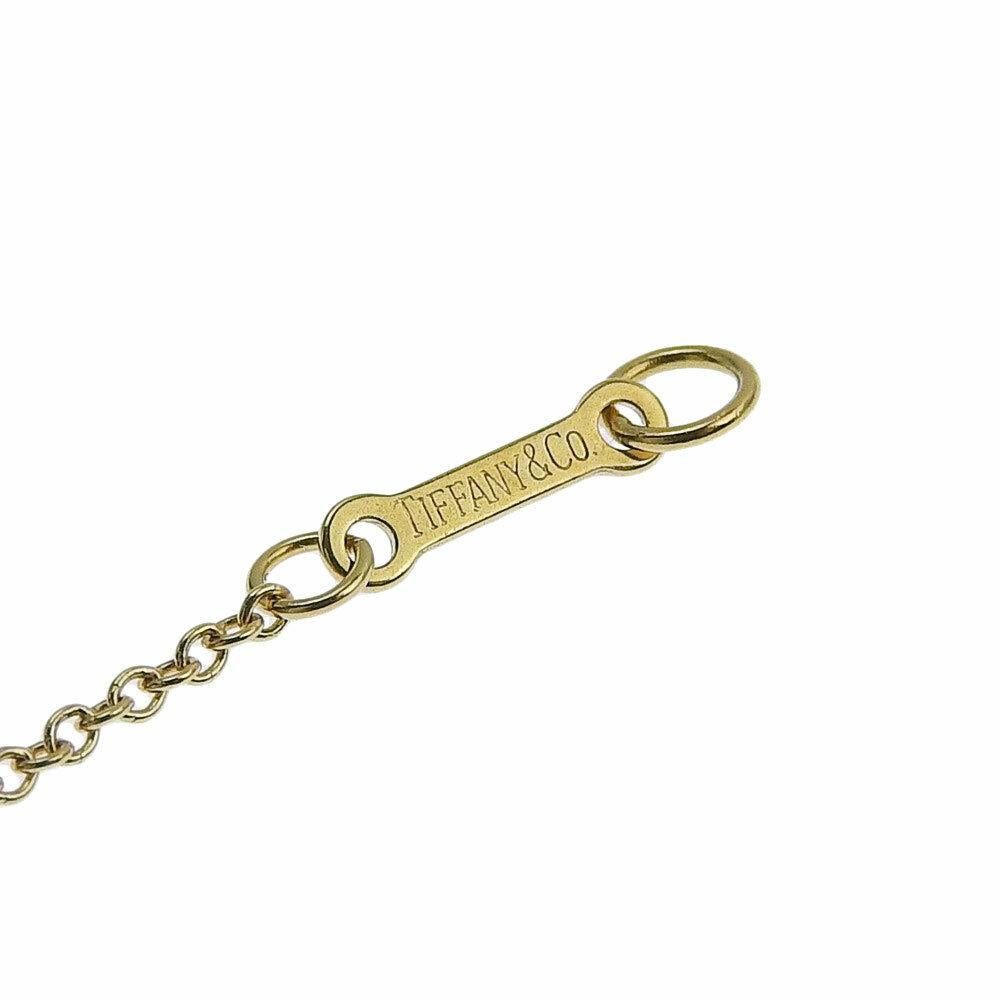 TIFFANY & Co. Paloma Picasso 18K Gold Diamond X Pendant Necklace 3