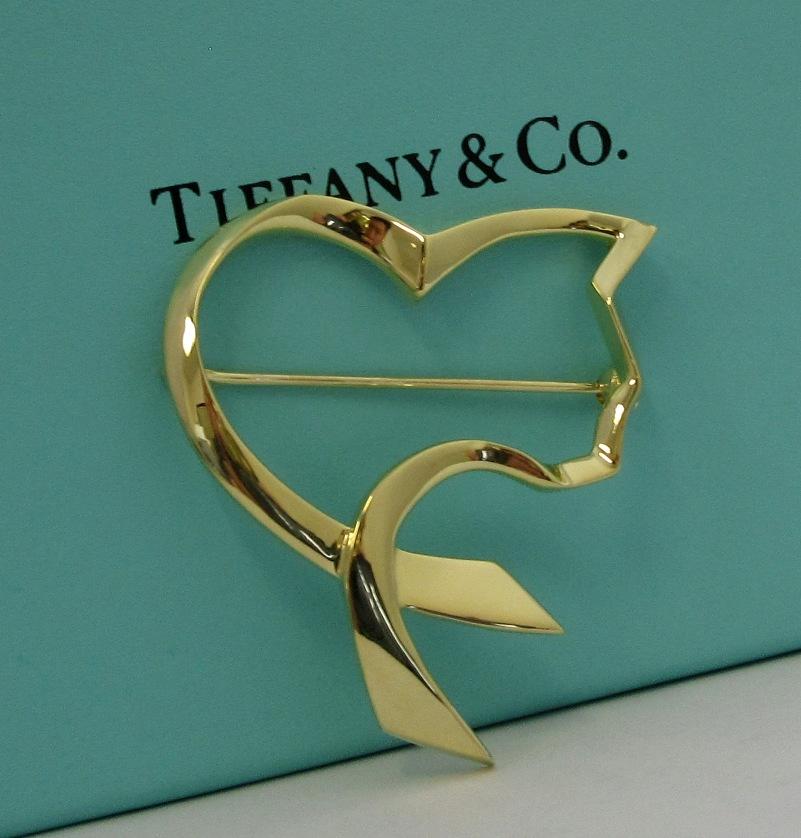 TIFFANY & Co. Paloma Picasso 18K Gold Friend's Cat Pin Brooch 

Metal: 18K Yellow Gold 
Weight: 9.70 grams 
Measurement: 33mm(1.3