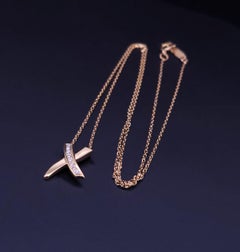 TIFFANY & CO. Paloma Picasso 18k Gold Kiss X Diamond Pendant Necklace