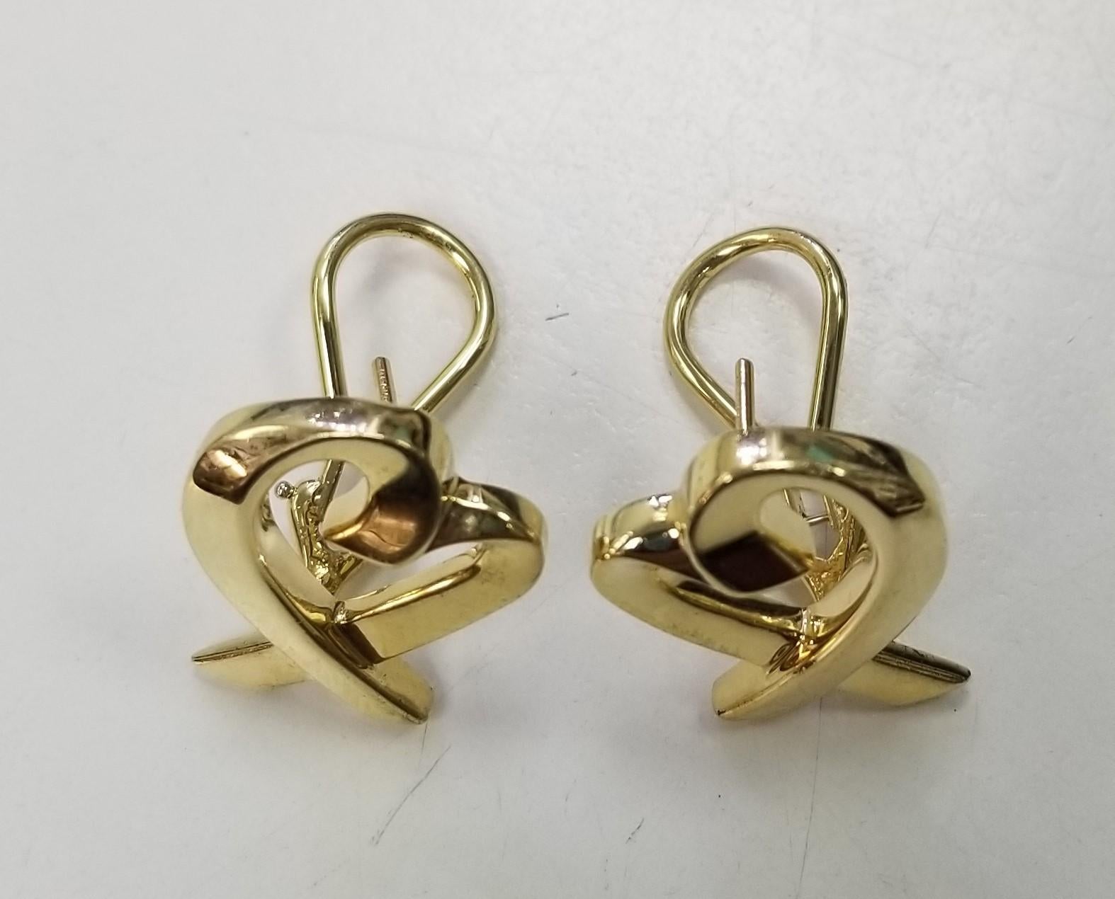 Specifications:
Pre-Owned (Great condition)
Brand: Tiffany & Co
Metal: 18K (Au 79.80-75%) Gold
Item specifics
Condition Pre-owned: Brand Tiffany & Co.
Type Earrings
Shape Heart
Metal Purity 18k
Closure Lever Back
Signed Yes
Style Huggie
Base Metal