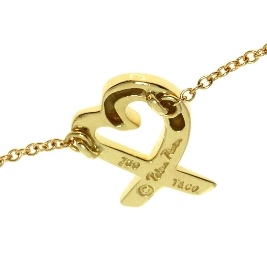 TIFFANY & Co. Paloma Picasso Collier à pendentif cœur aimant en or 18K Pour femmes en vente