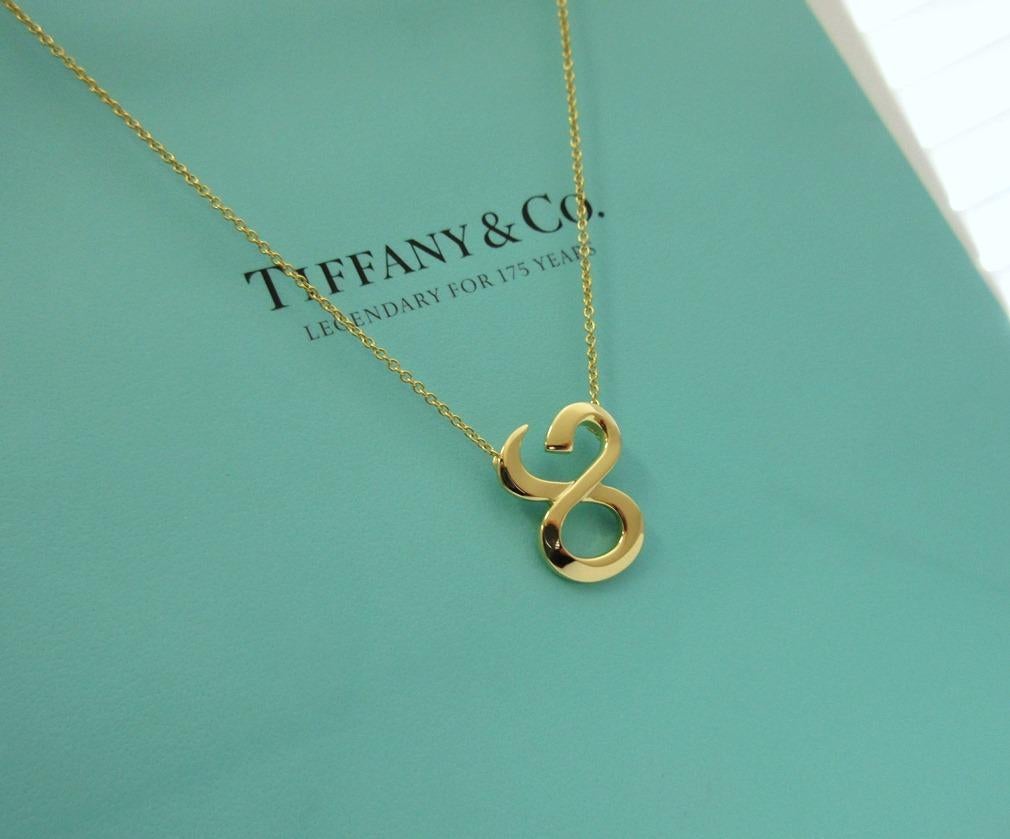 Women's TIFFANY & Co. Paloma Picasso 18K Gold Zodiac Taurus Pendant Necklace  For Sale