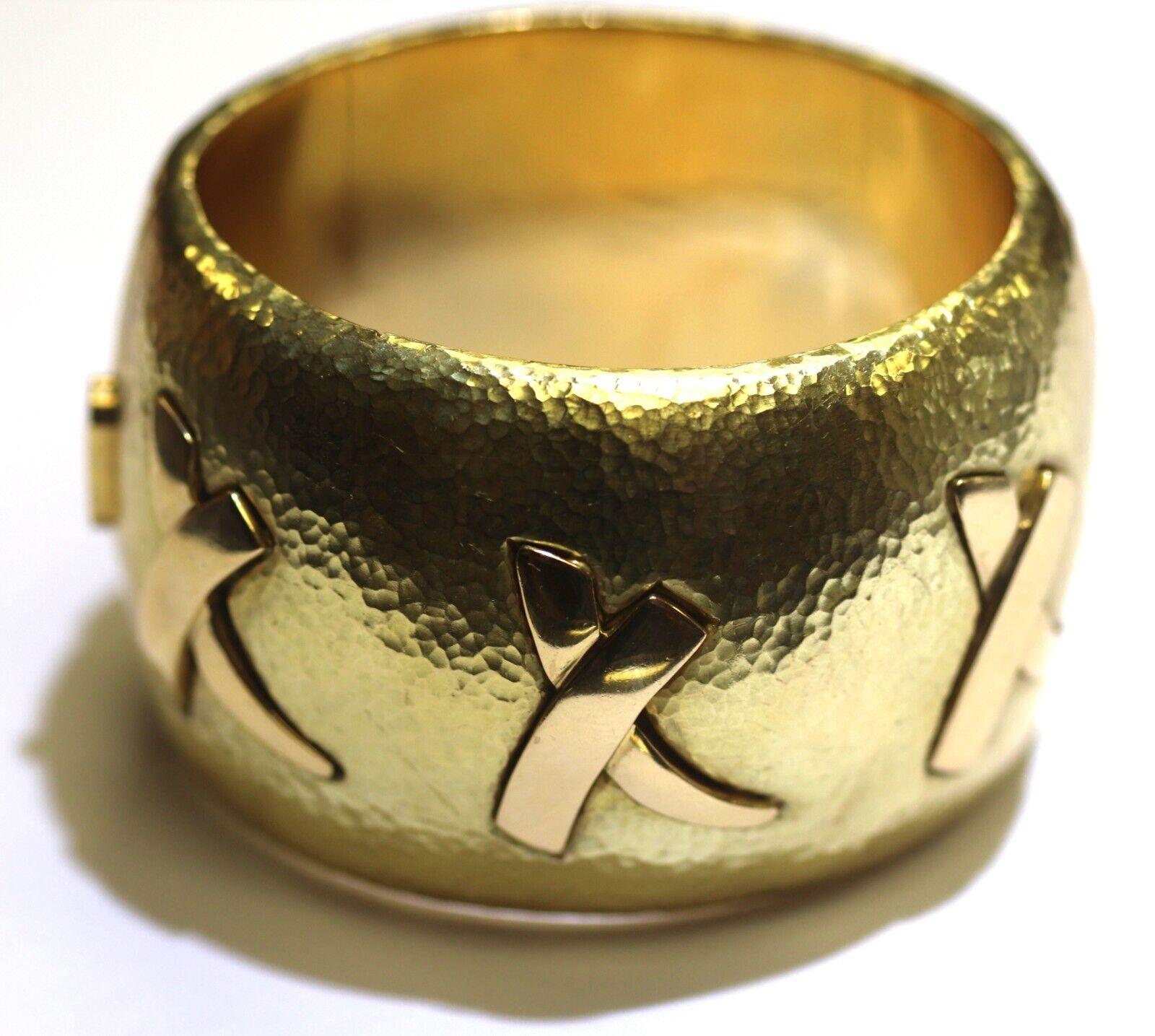 Tiffany & Co. by Paloma Picasso 18k Hammered Yellow Gold X Cuff Bracelet 1990 Rare

Here is your chance to purchase a beautiful and highly collectible designer cuff bracelet. 

Creator: 
Tiffany & Co. by Paloma Picasso
Metal: 
Yellow Gold,18k