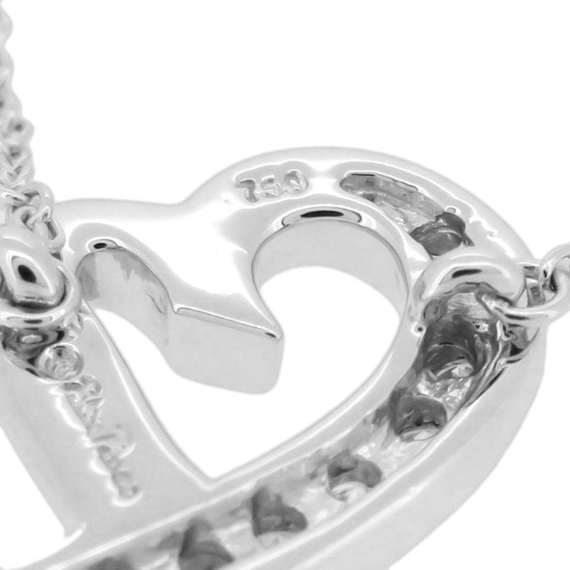 TIFFANY & Co Paloma Picasso Collier pendentif cœurs amoureux en or blanc 18 carats et diamants en vente 1