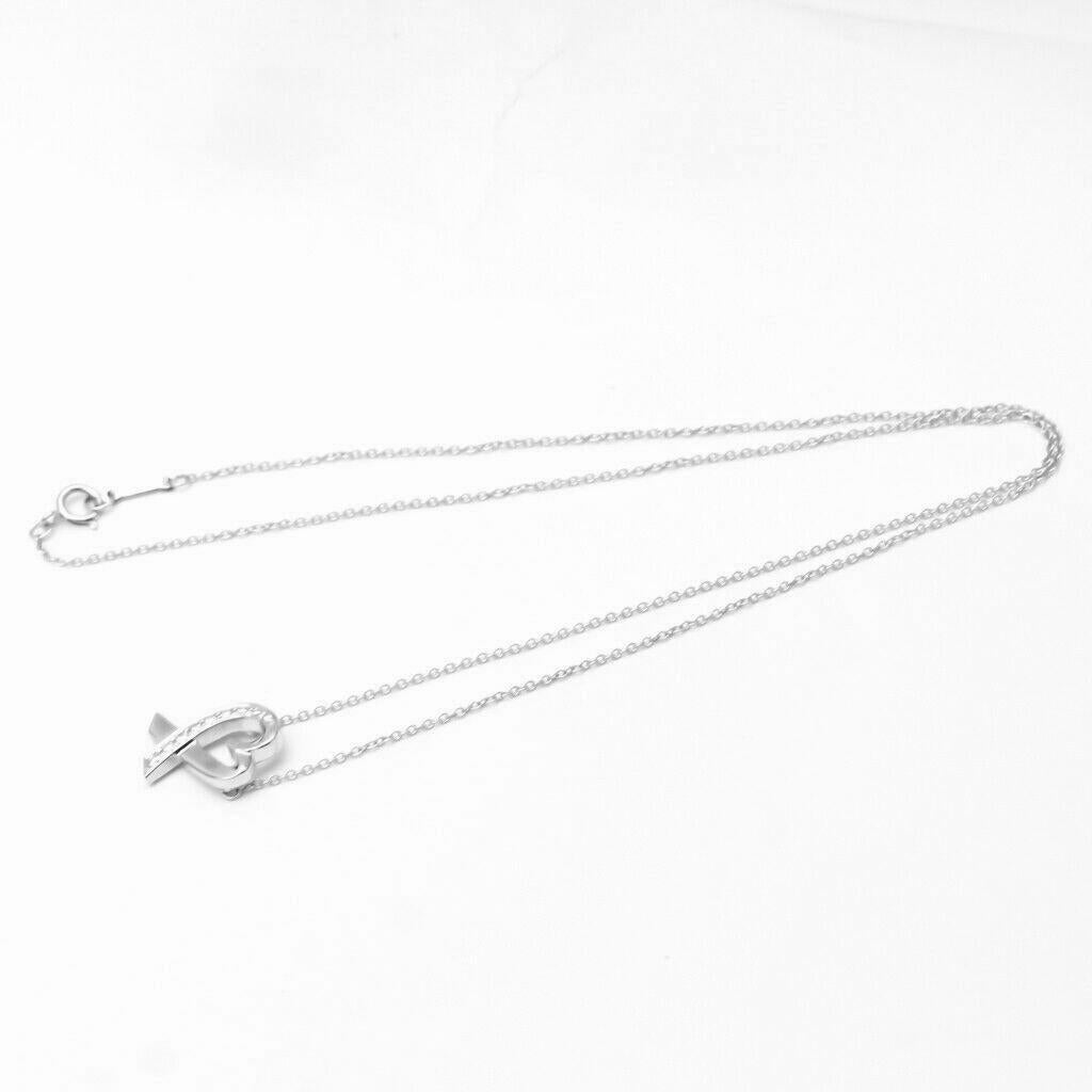 TIFFANY & Co Paloma Picasso Collier pendentif cœurs amoureux en or blanc 18 carats et diamants en vente 2