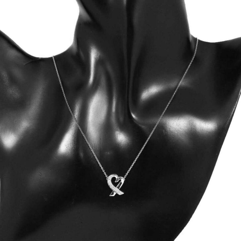 TIFFANY & Co Paloma Picasso Collier pendentif cœurs amoureux en or blanc 18 carats et diamants en vente 3
