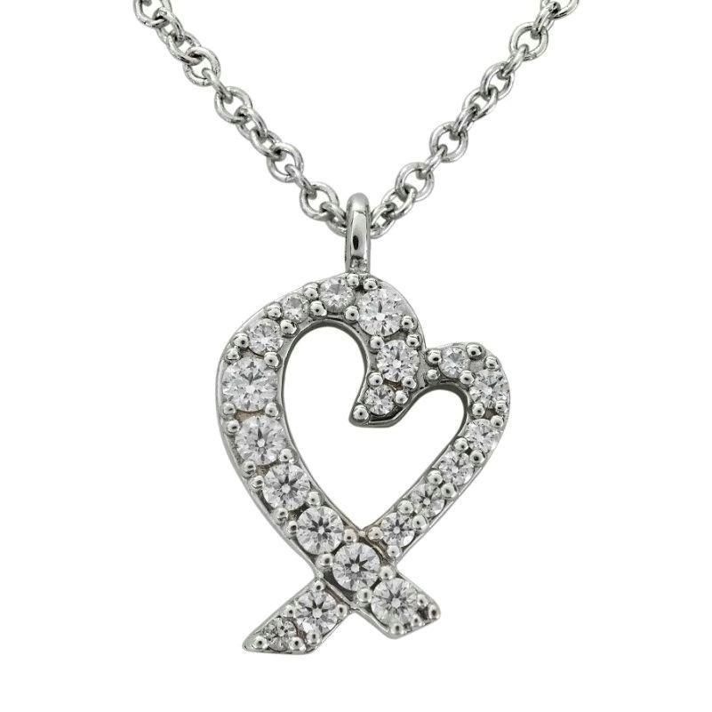 TIFFANY & Co Paloma Picasso Collier pendentif cœurs amoureux en or blanc 18 carats et diamants en vente
