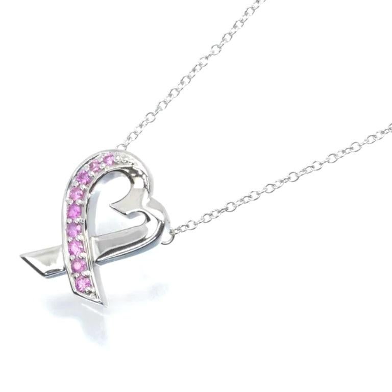 TIFFANY & Co. Paloma Picasso 18K White Gold Pink Sapphire Loving Heart Pendant Necklace

Metal: 18K White Gold 
Weight: 3.50 grams
Chain: 16