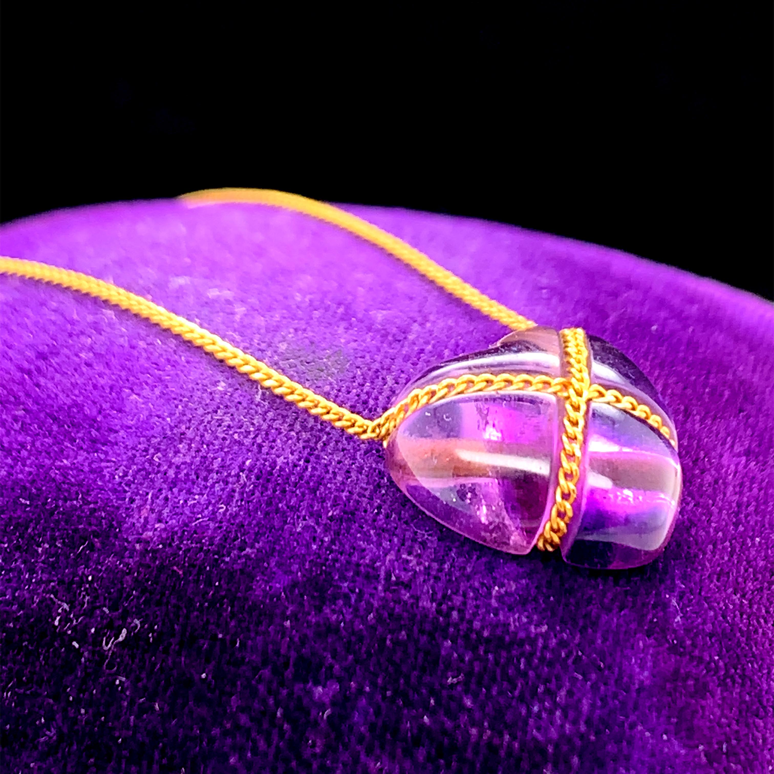 Year: 1990s

Item Details: 
Metal Type: 18K Yellow Gold [Hallmarked, and Tested]
Weight:  3.2 grams

Amethyst Details:
Weight: 4.00 carat (Approx)
Cut: Heart Shape
Color: Purple

Pendant Measurement: 12.8mm x 14mm
Skin to top of stone: 6.2mm
Chain