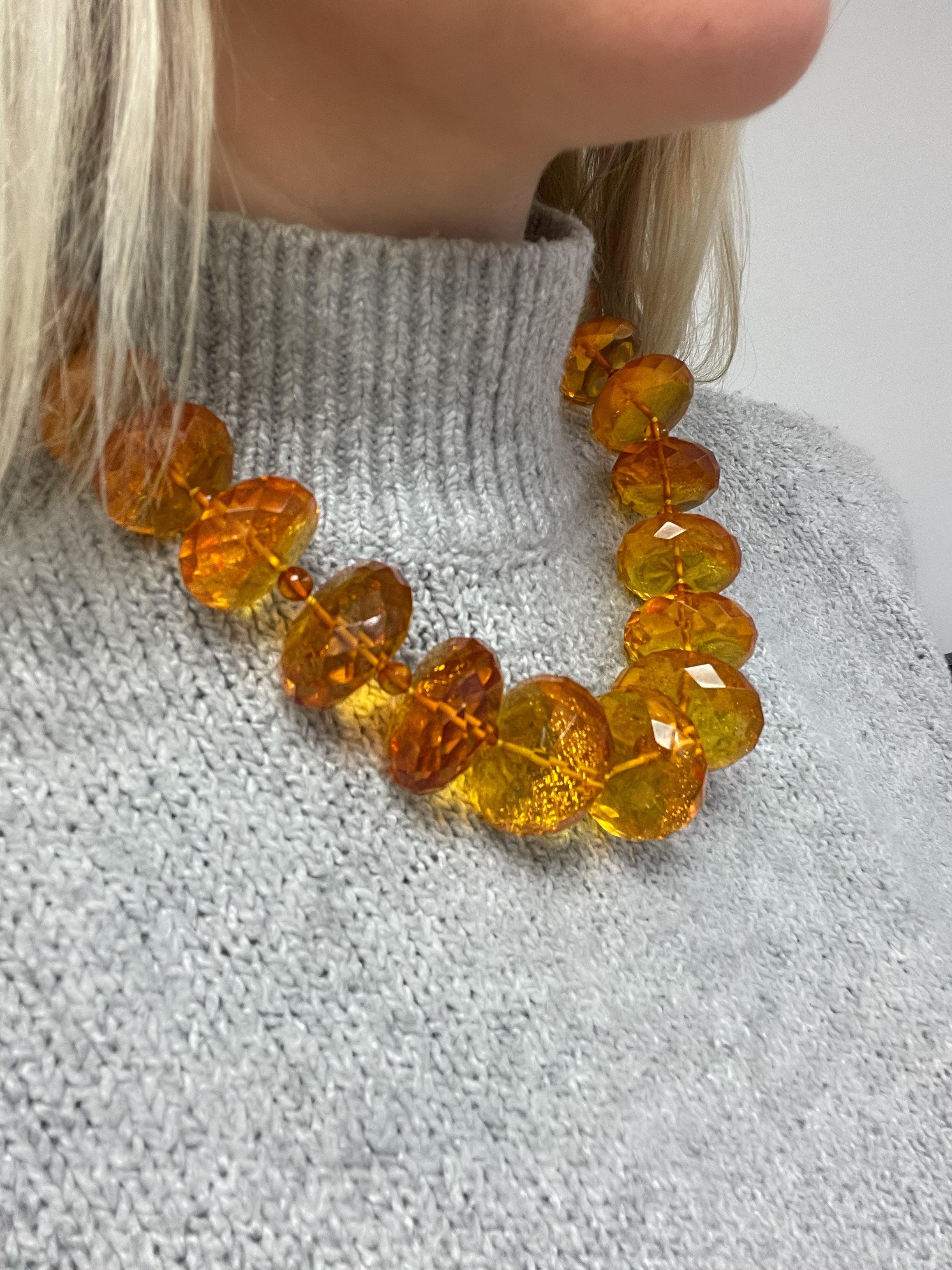 This fun and colorful Tiffany design by Paloma Picasso features faceted amber beads measuring approximately 20.00 - 32.00 mm with round amber spacer beads measuring 6.00 mm in diameter. Mounted in 18 karat yellow gold, this necklace is very