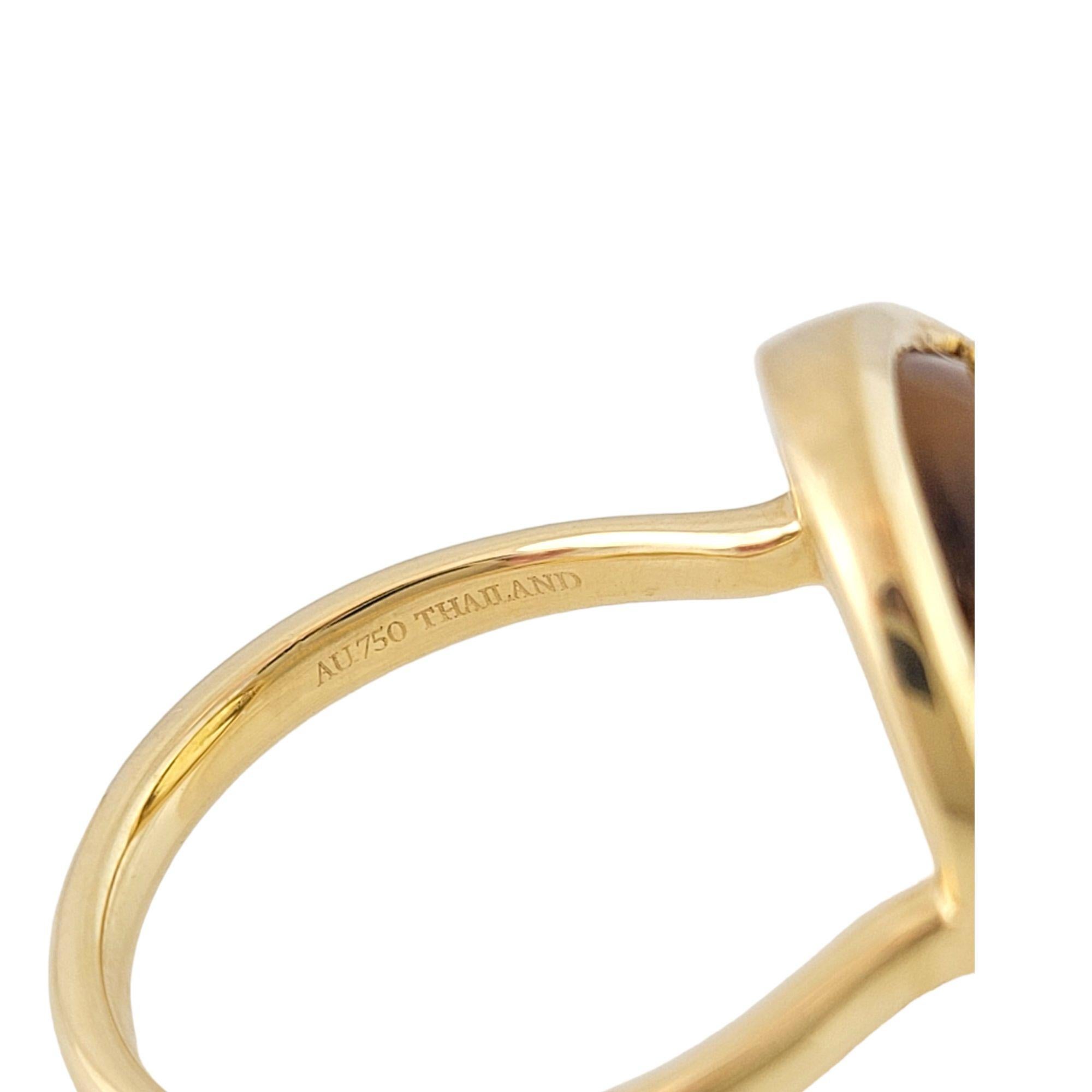Vintage Tiffany & Co. Paloma Picasso 18 Karat Yellow Gold and Citrine Olive Leaf Ring Size 5-

This stunning 18K yellow gold ring by features one oval cabochon citrine* in a lovely olive leaf motif setting. By Paloma Picasso for Tiffany & Co. Width: