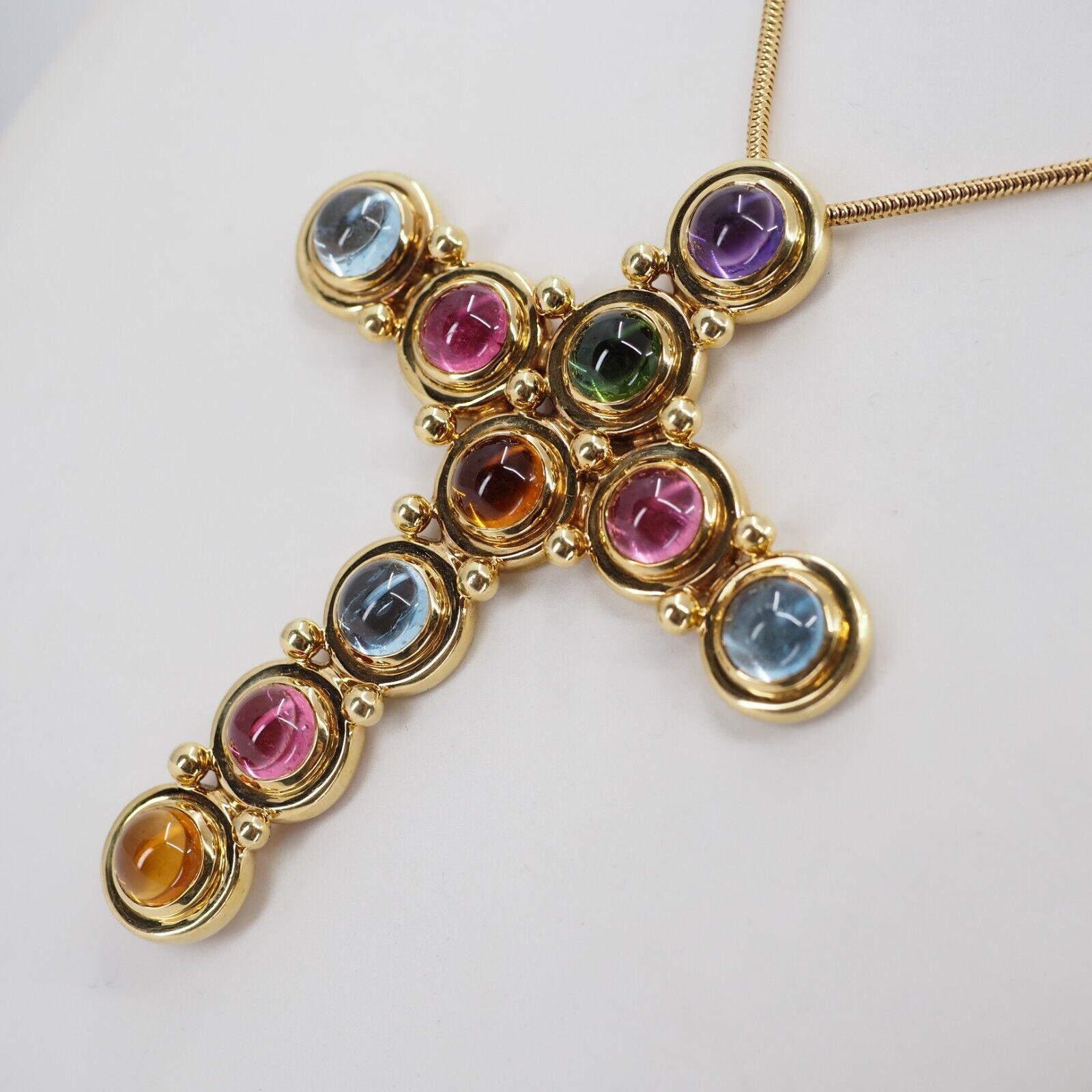 Tiffany & Co. Paloma Picasso 18k Yellow Gold & Multi Gemstone Cross Pendant Necklace Vintage 1970s

Here is your chance to purchase a beautiful and highly collectible designer necklace. Truly a great piece at a great price! 


Details:

The necklace